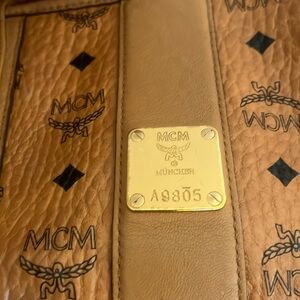 I am selling MCM  and New York Co pocket books and,also size 7.5 white Fila